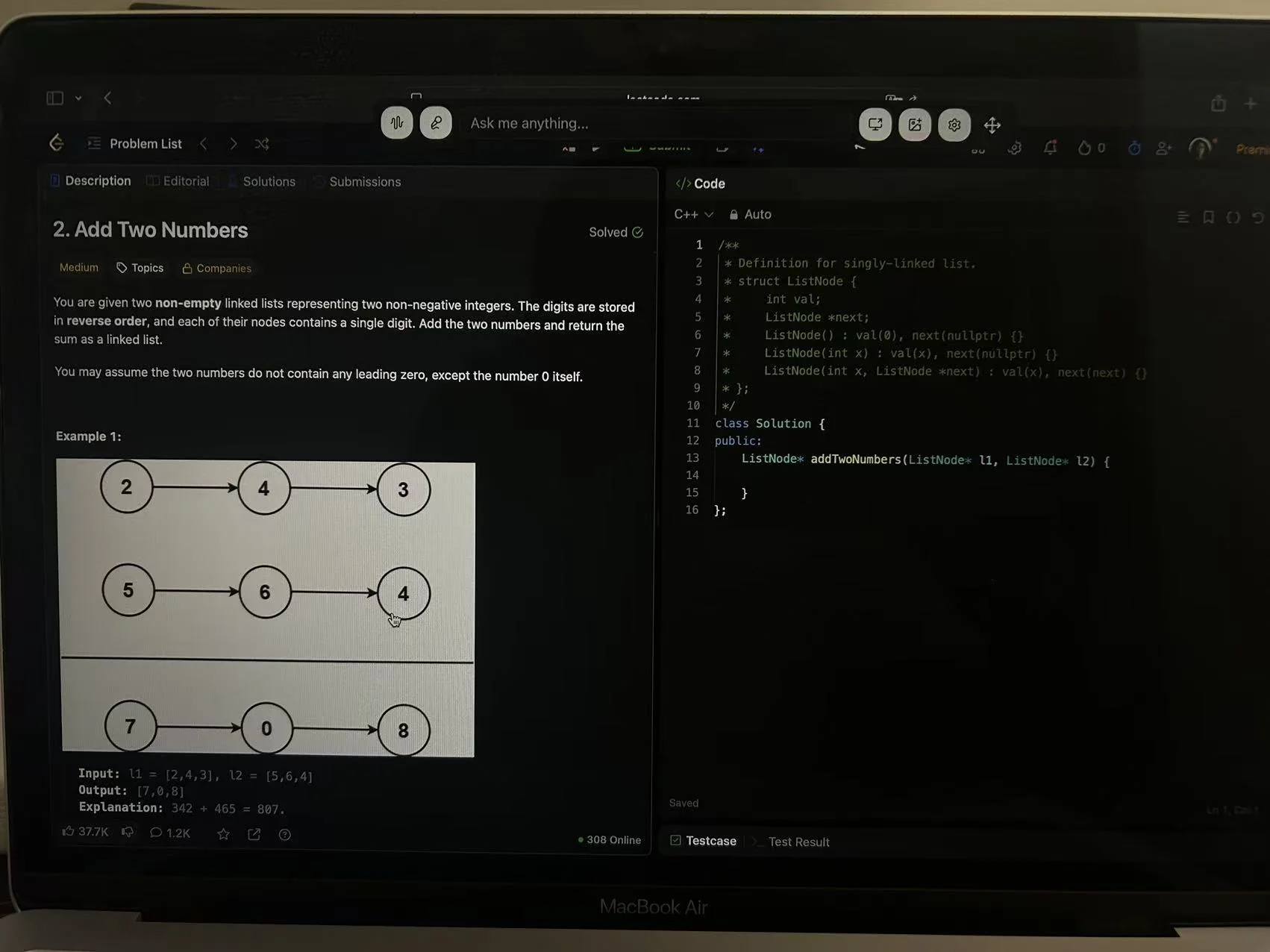 User-provided photograph showing LeetCode Add Two Numbers, an empty C++ function, and the SkillCopilotAI toolbar